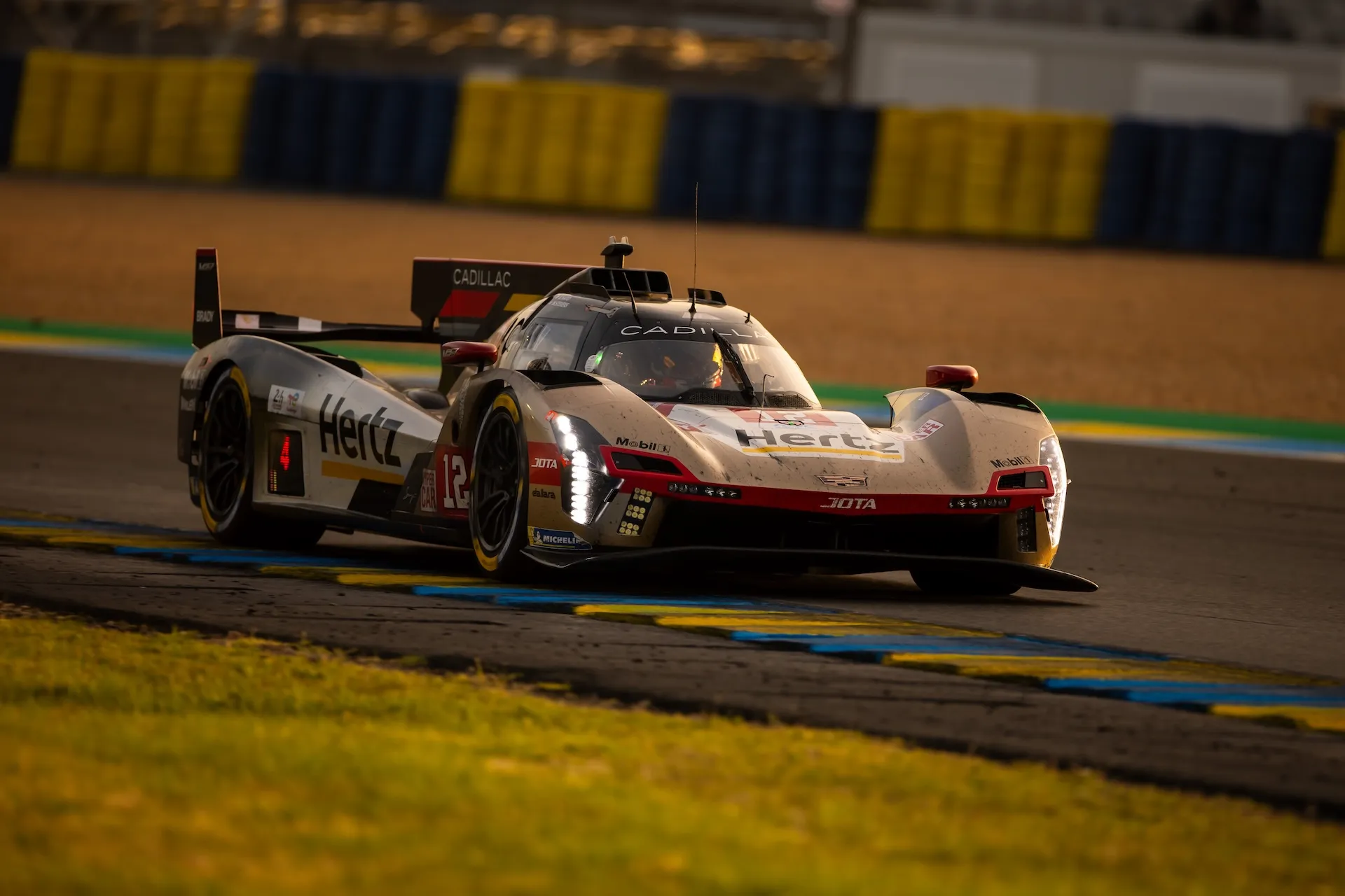 The #12 Cadillac V-Series.R of Cadillac Hertz Team Jota, driven by Louis Deletraz of Switzerland, Will Stevens of Great Britain, and Norman Nato of France, competes during the 94th 24 Hours of Le Mans, a round of the FIA World Endurance Championship, at Circuit des 24 Heures du Mans on June 14, 2026, in Le Mans, France. (Photo by Daniele Paglino/NurPhoto)