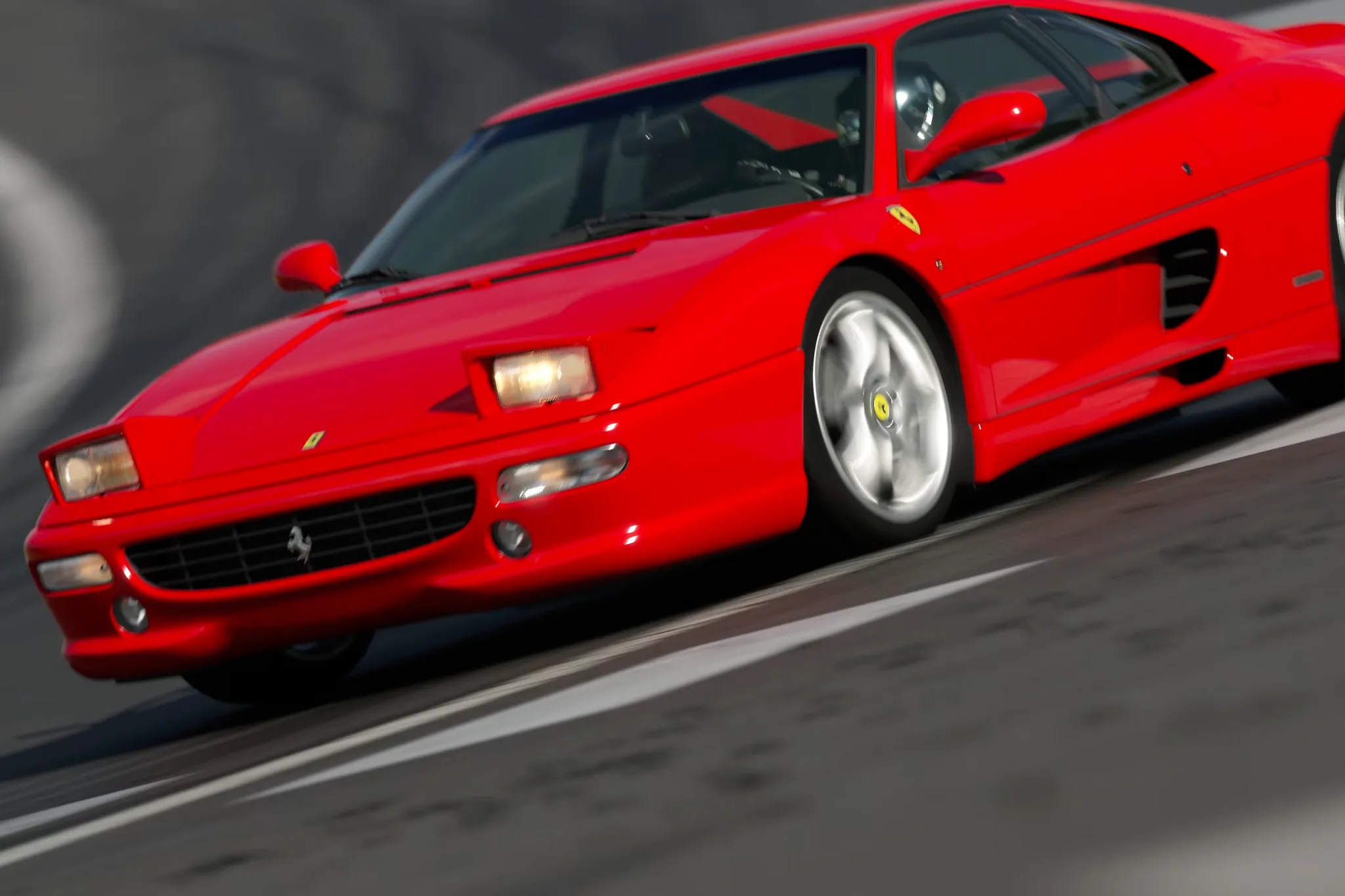 Скріншот Gran Turismo 7 з Ferrari F355 за кермом